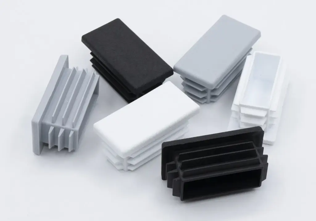 Заглушка пластиковая прямоугольная для труб 25х50 мм, черная